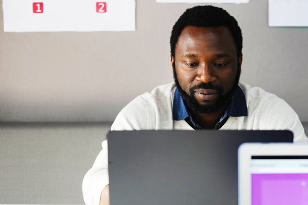 Man working at his computer