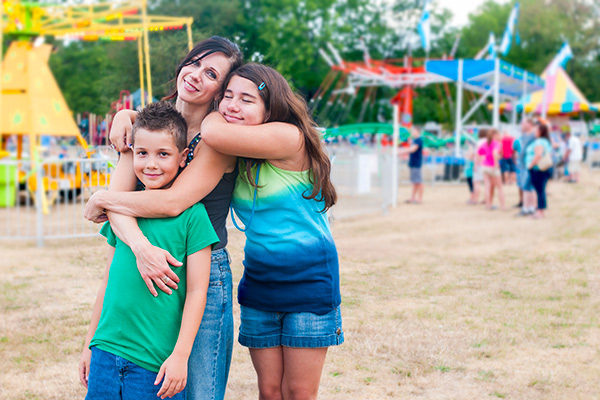 Mom with son and daughter at park