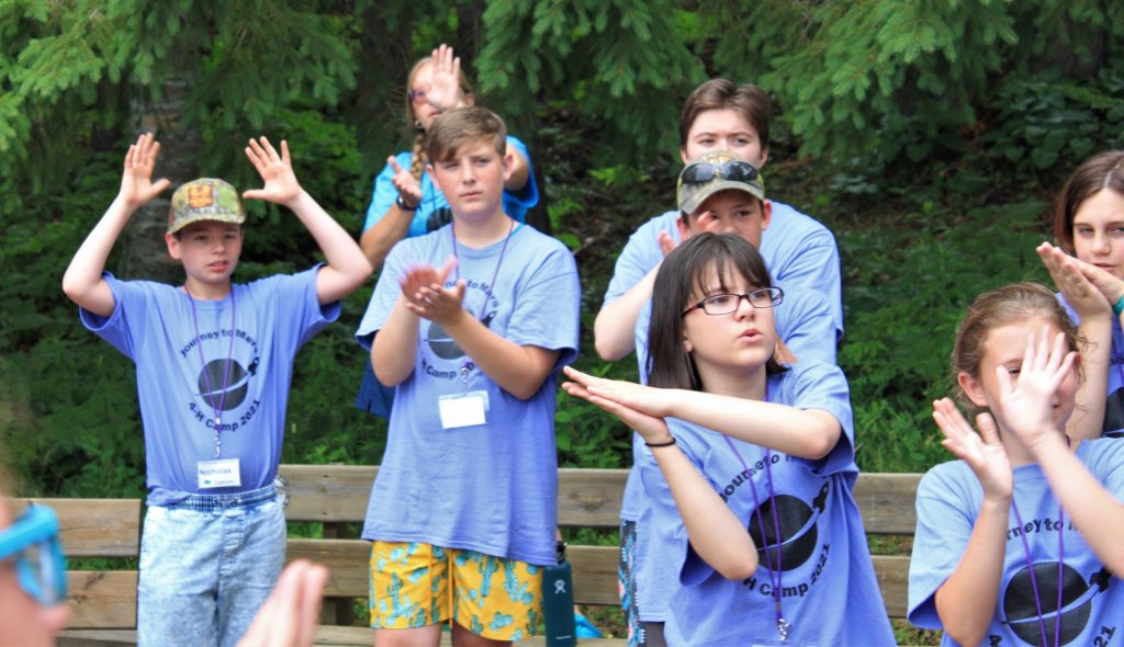 a group of youth participating in an activity