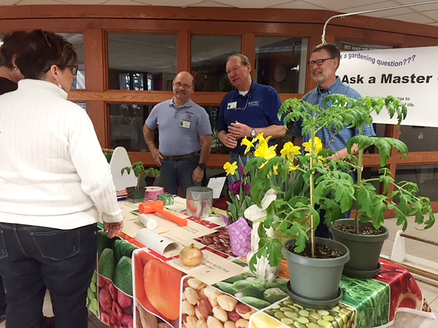 A group of master gardeners answering questions